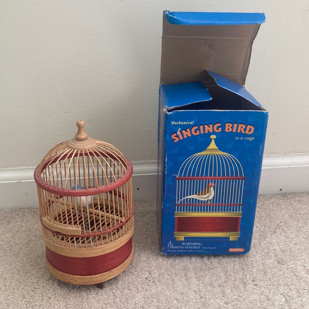 Schylling Vtg mechanical singing bird in a cage